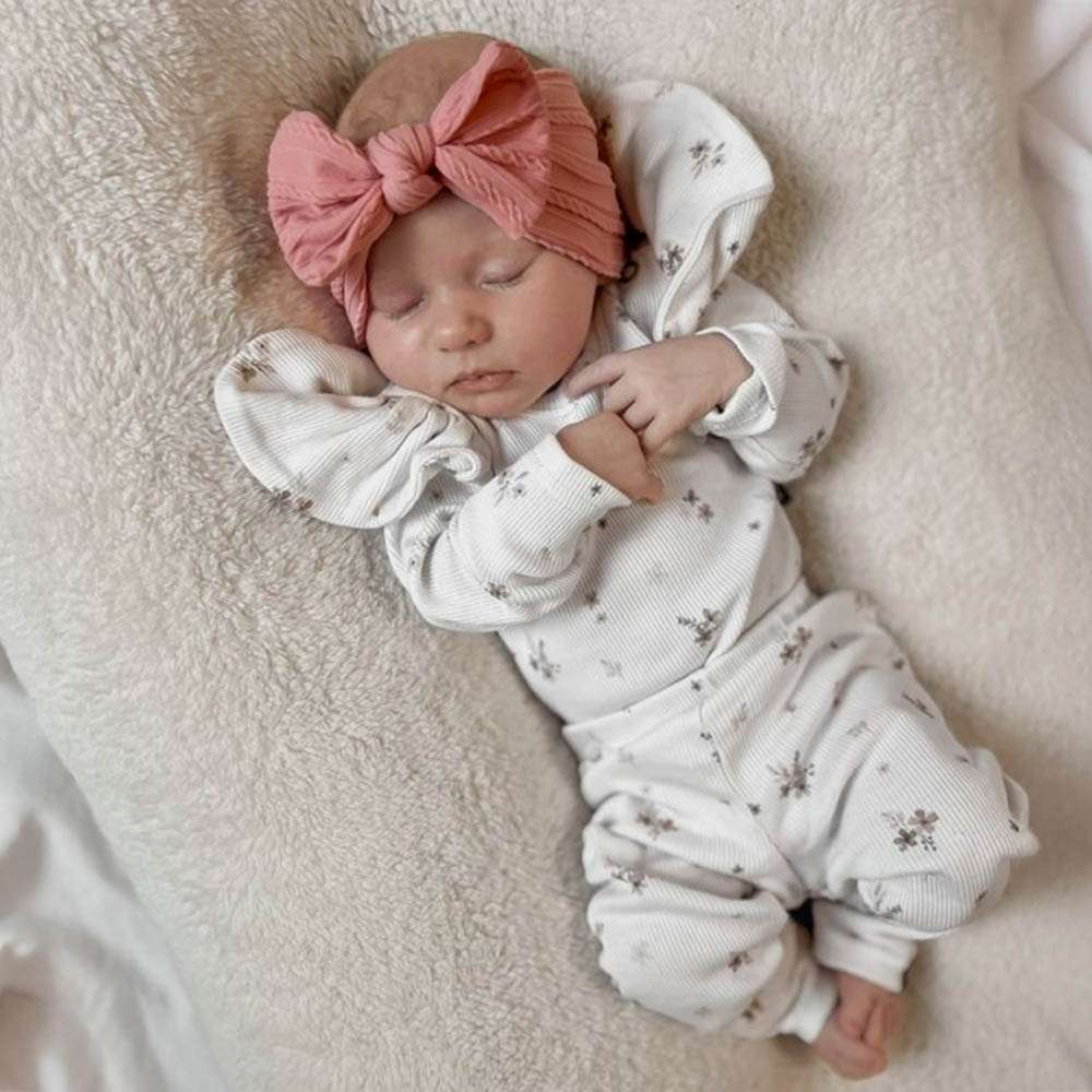 Babystyling röyhelöbody rib karla offwhite.