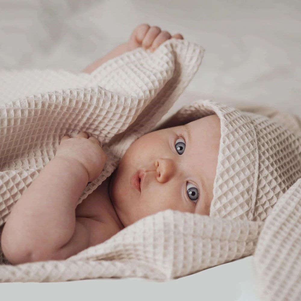 SWANIE Huppupyyhe vauvalle Saaga Beige.