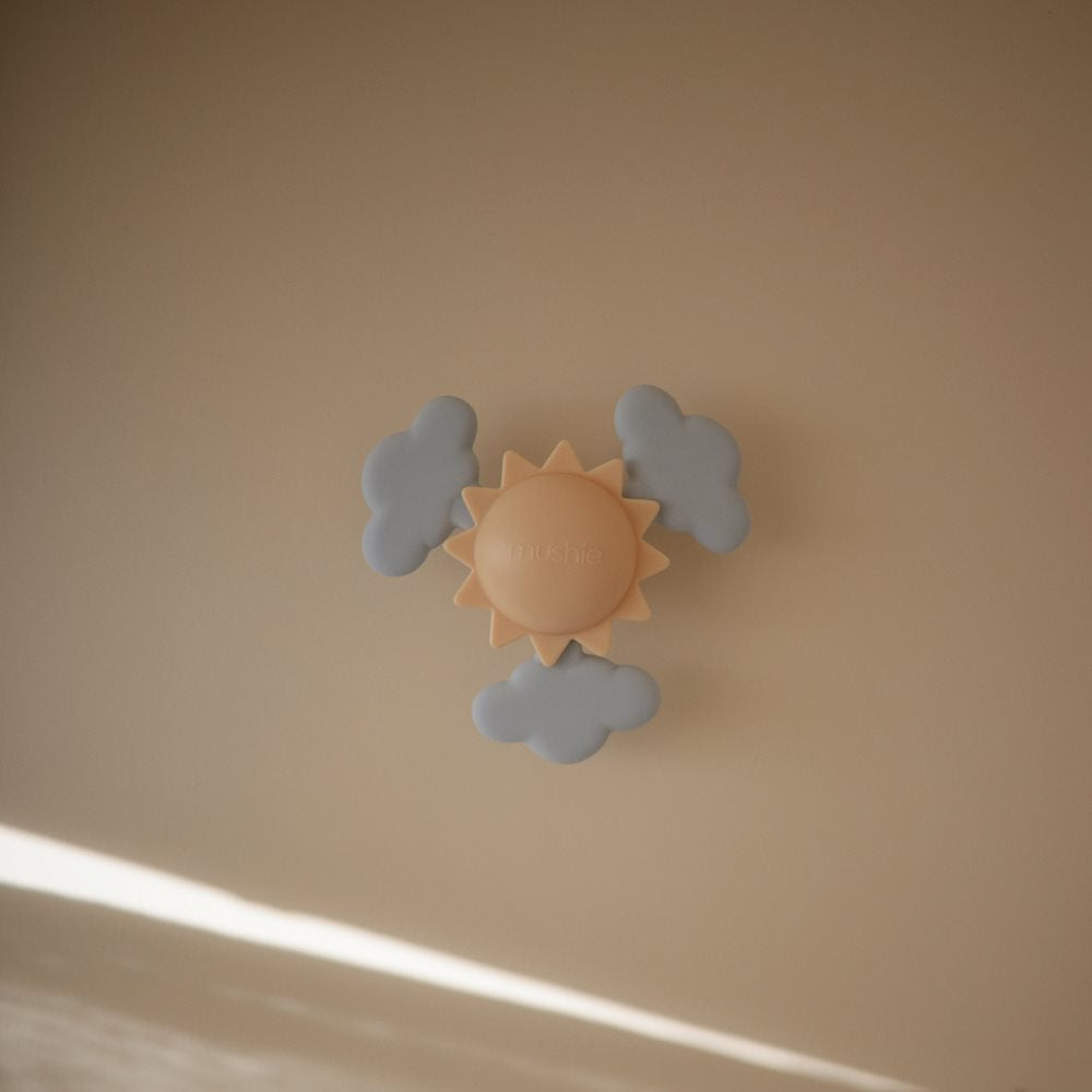 MUSHIE Aktiviteettilelu imukupilla Spinner Toy - Sunshine