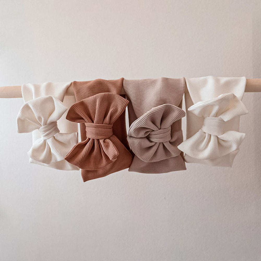 SWANIE Headwrap rusettipantoja löytyy eri väreissä.
