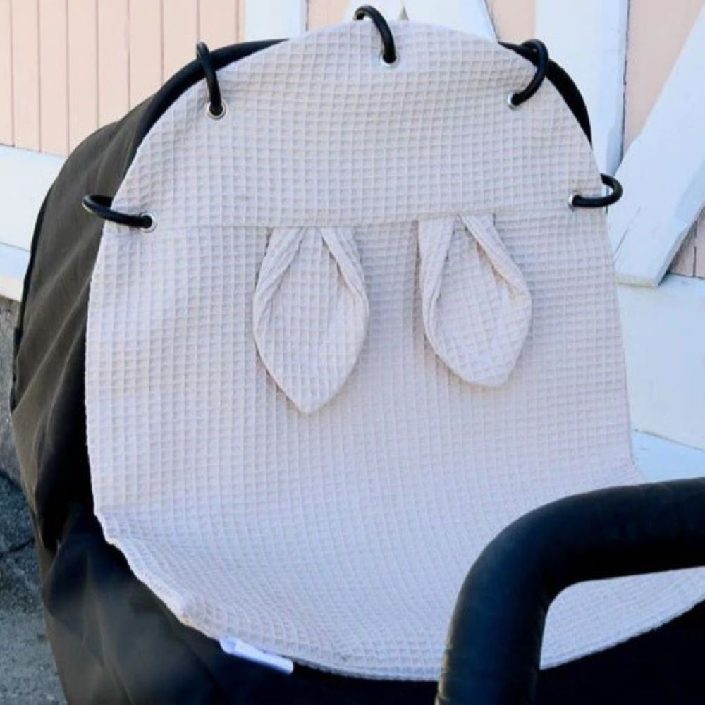SWANIE Vaunuverho Jänö Beige vaunuissa.