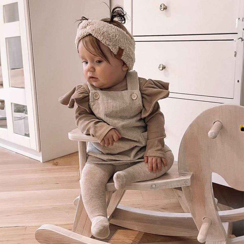 Babystyling röyhelöbody beige.