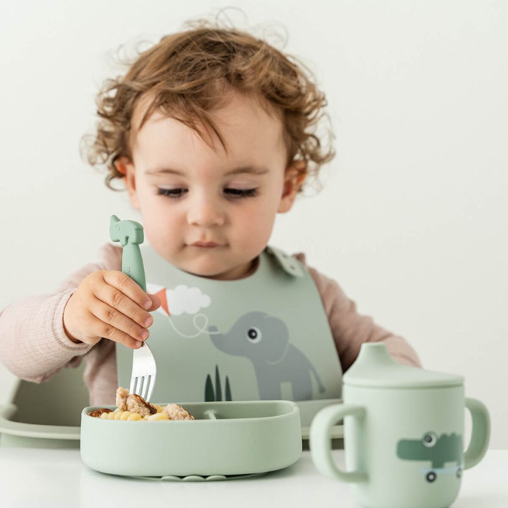 DONE BY DEER Silikoninen lokerokulho imukupilla Playground - Green